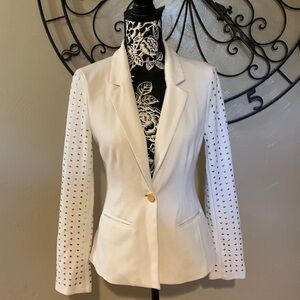 Lovely cream/white jacket with gold embellishments on the sleeves